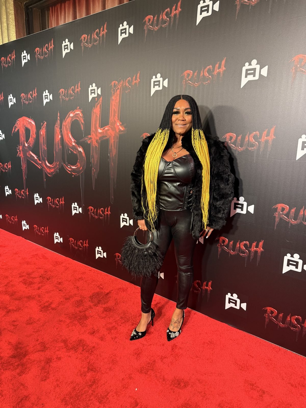 Jay Plush on the red carpet at a RUSH event